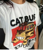 Cat Bus Graphic T-Shirt - Whimsical Cartoon Cat Print Tee